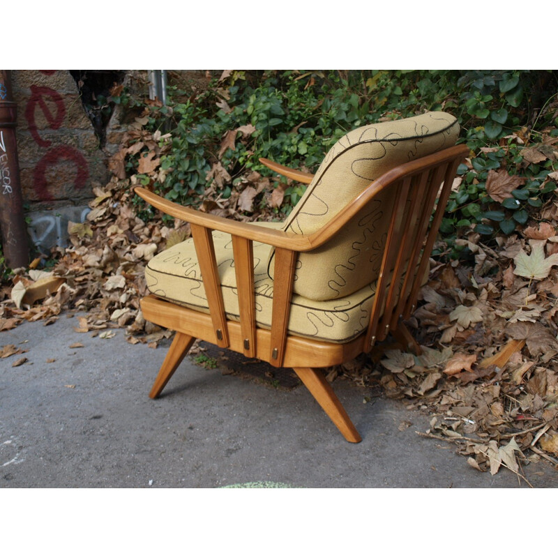 Mid-century armchair in light yellow fabric and wood - 1950s