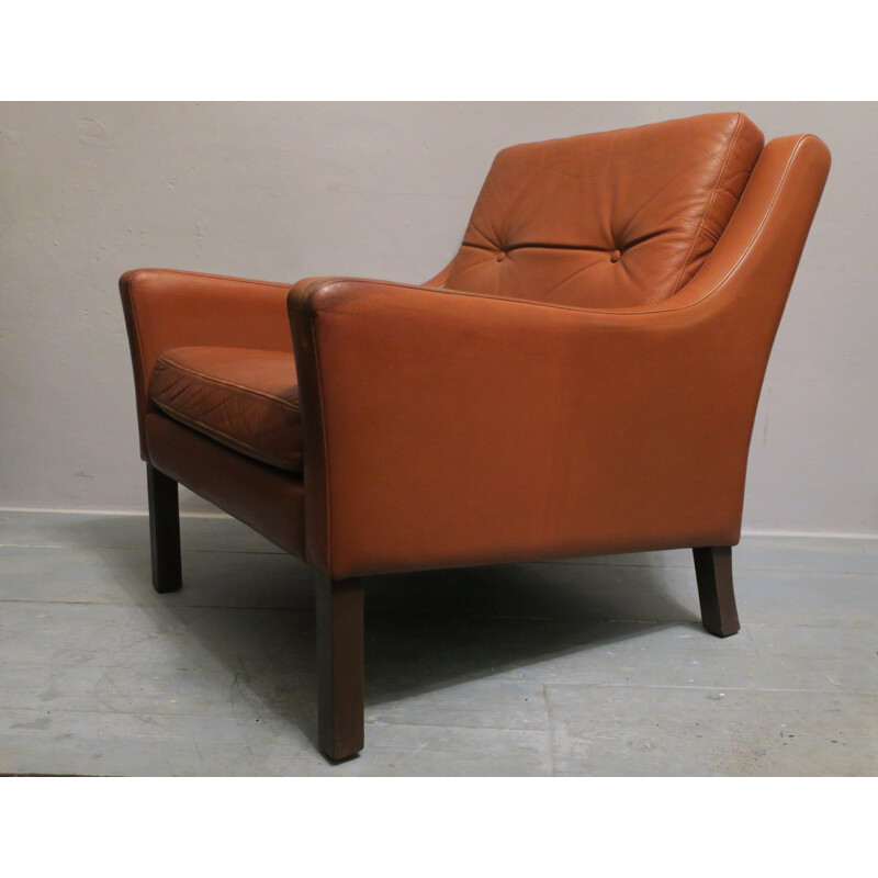 Fauteuil scandinave en bois et cuir rouge - 1970