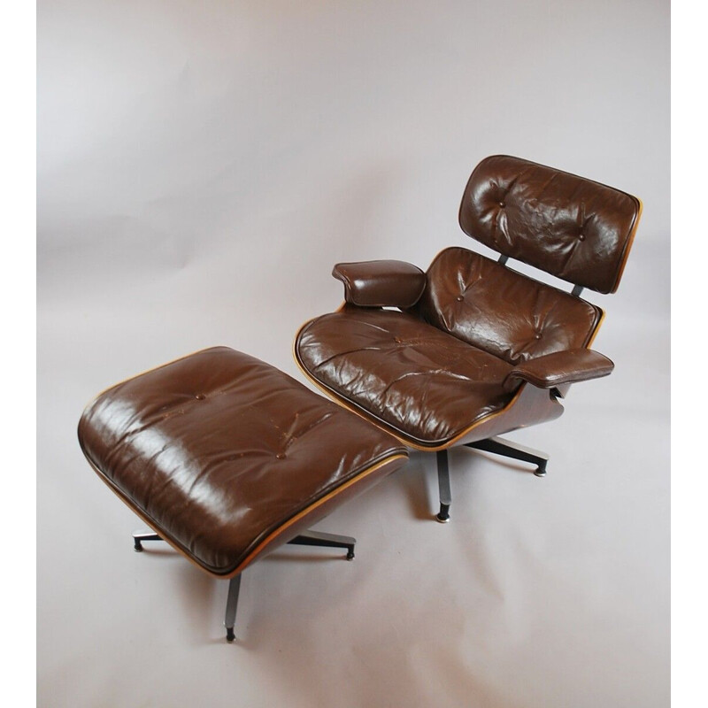 Vintage Eames armchair and ottoman by Herman Miller, 1950s