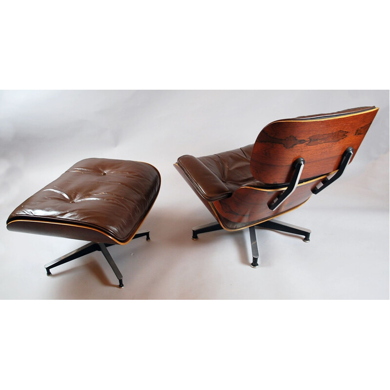 Vintage Eames armchair and ottoman by Herman Miller, 1950s