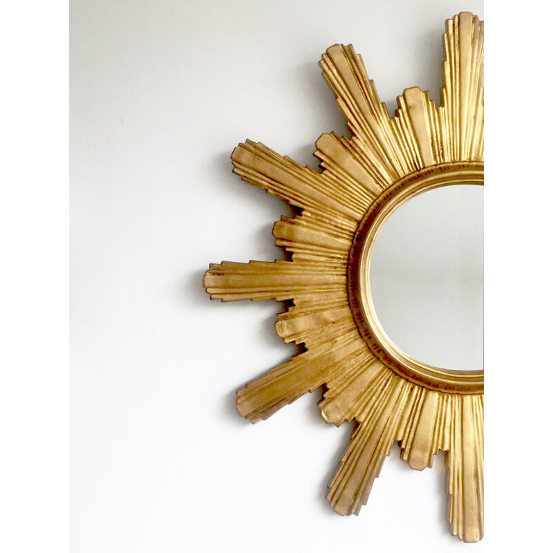 Large carved wooden sunburst mirror - 1960s