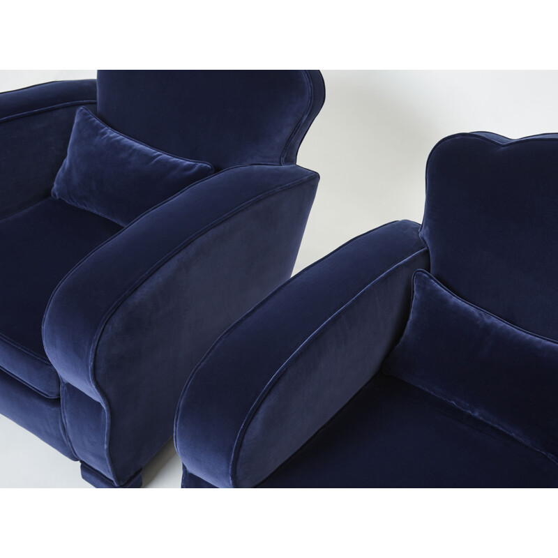 Pair of midnight blue velvet club chairs by Jules Leleu, 1940s