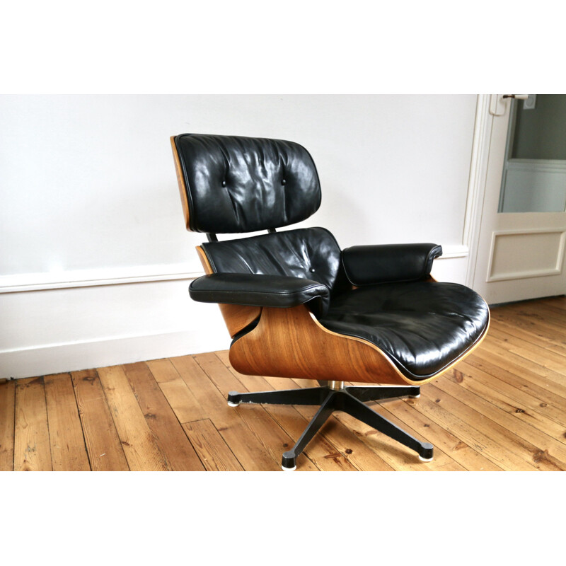 Mid-century lounge chair rosewood by Charles & Ray Eames, 1991s