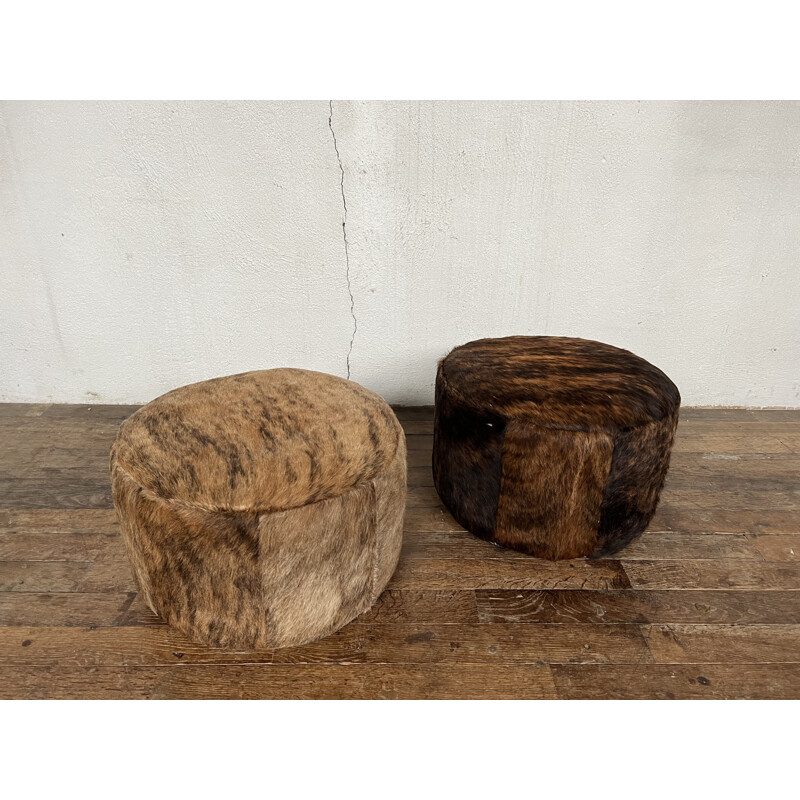 Pair of vintage cowhide poufs, 1960-1970