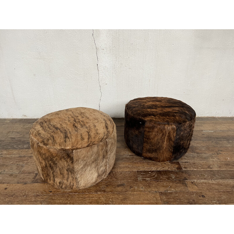 Pair of vintage cowhide poufs, 1960-1970