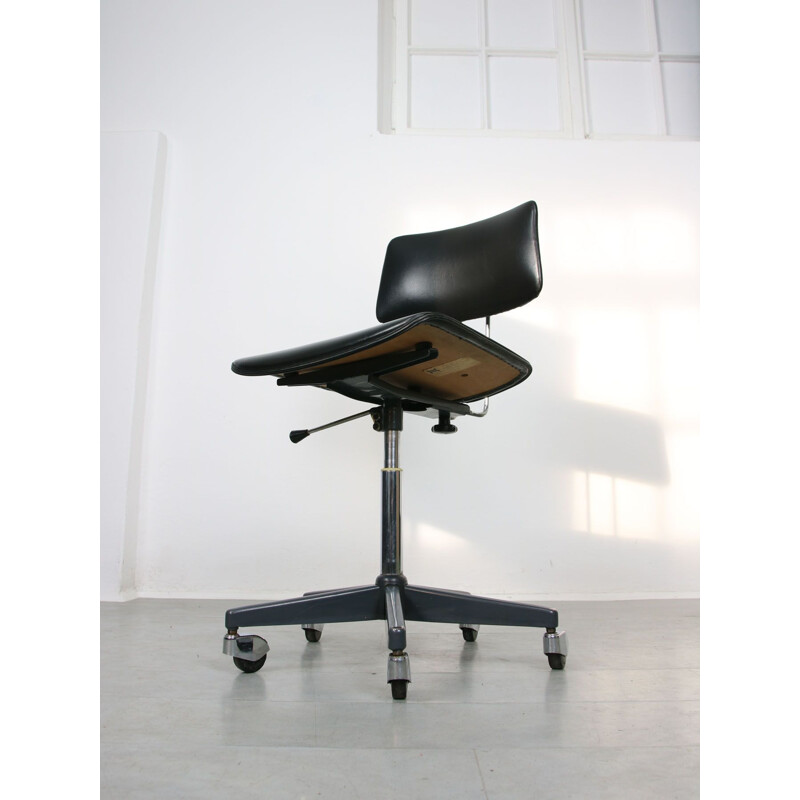 Mid-century black office swivel armchair by Stol Kamnik