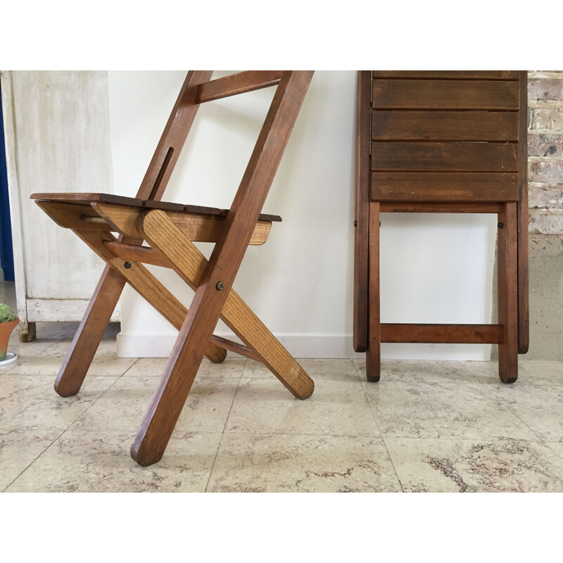 Paire de chaises pliantes vintage en bois