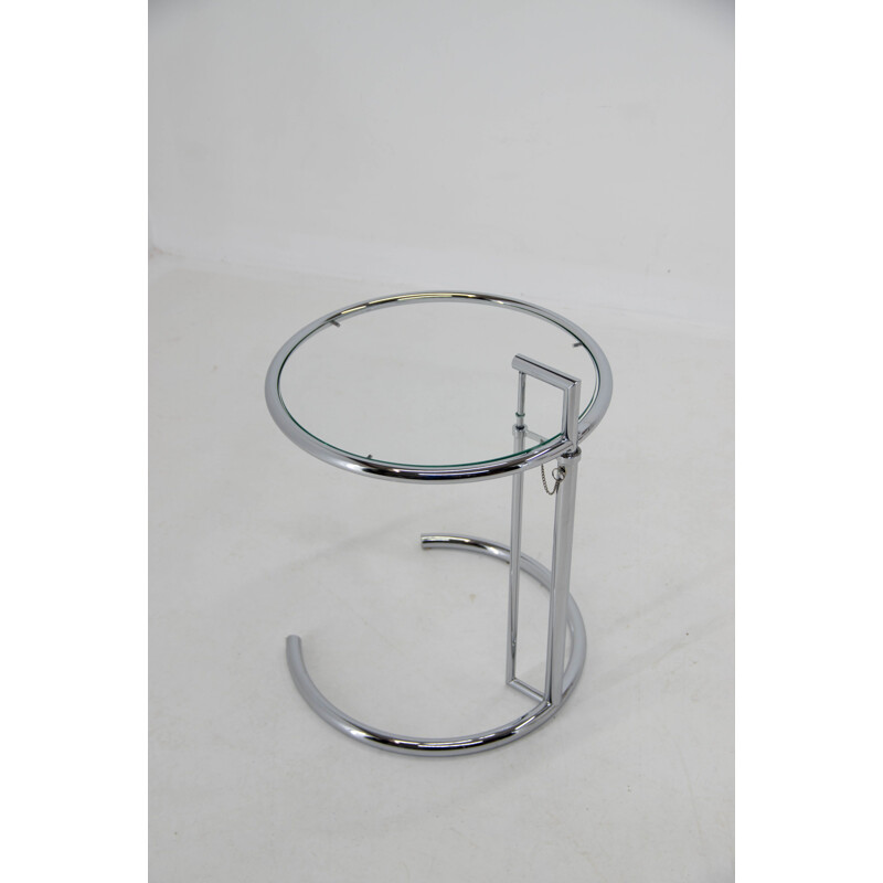 Vintage adjustable side table in chrome and crystal by Eileen Gray