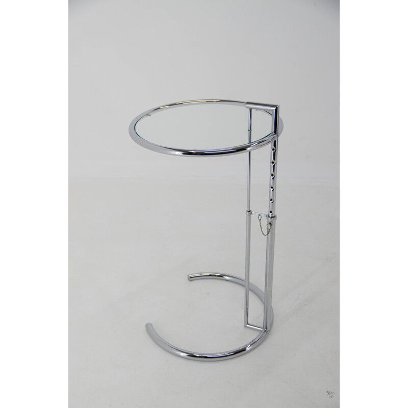 Vintage adjustable side table in chrome and crystal by Eileen Gray