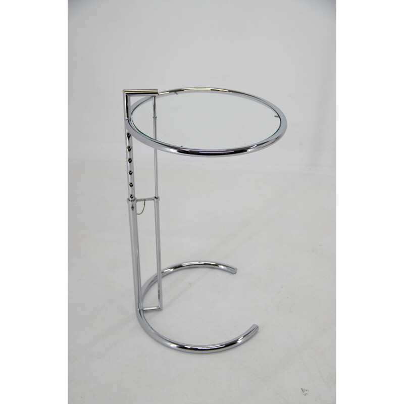 Vintage adjustable side table in chrome and crystal by Eileen Gray