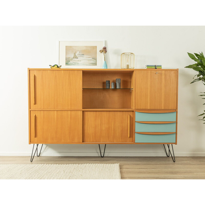 Vintage ashwood highboard with three sliding doors and blue drawers, Germany 1960s