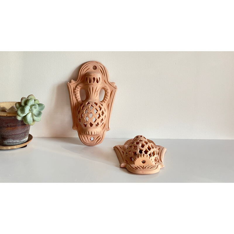 Pair of vintage terracotta wall candlesticks