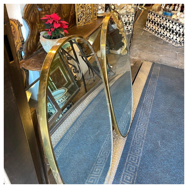 Pair of Giò mid-century brass Italian oval wall mirrors, 1960s