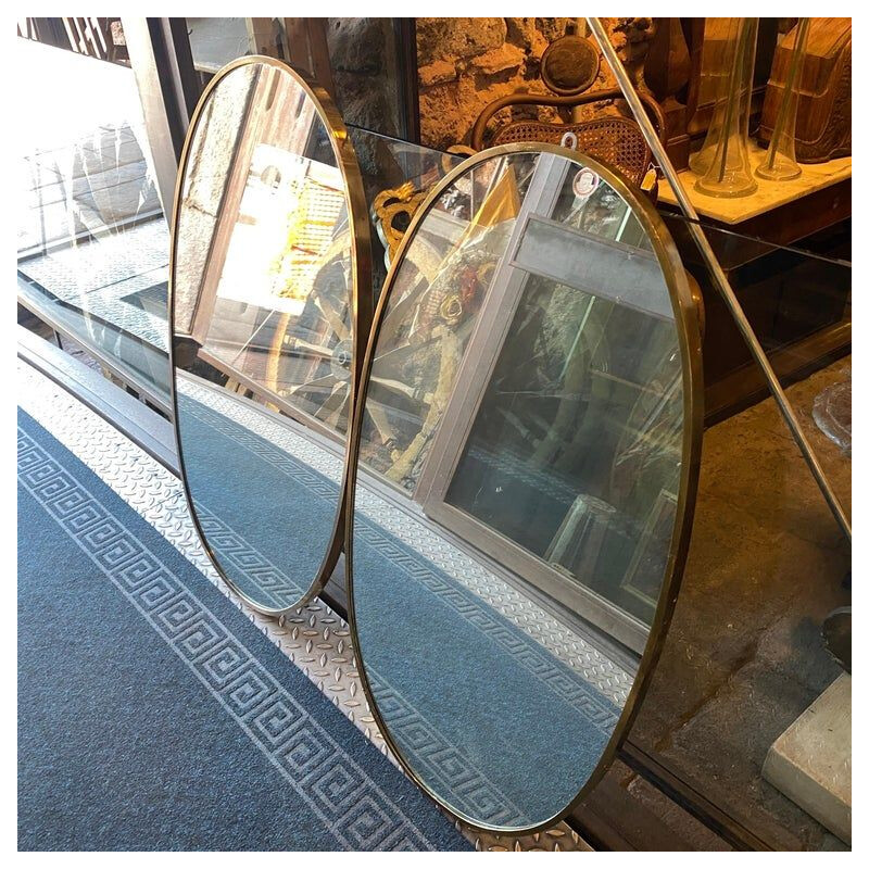 Pair of Giò mid-century brass Italian oval wall mirrors, 1960s