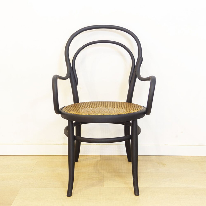 Fauteuil vintage en bois courbé noir avec siège en rotin