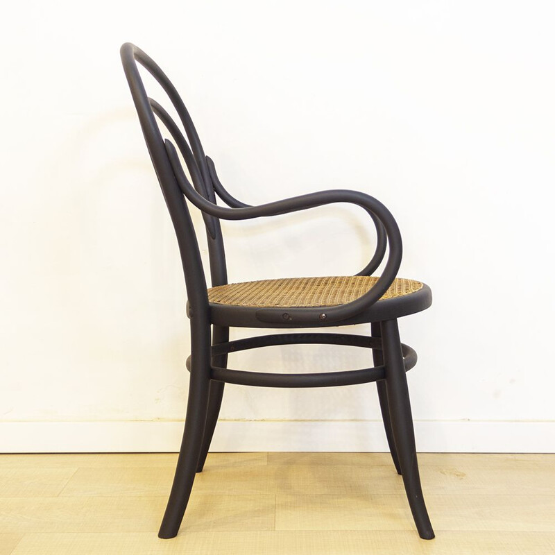 Fauteuil vintage en bois courbé noir avec siège en rotin