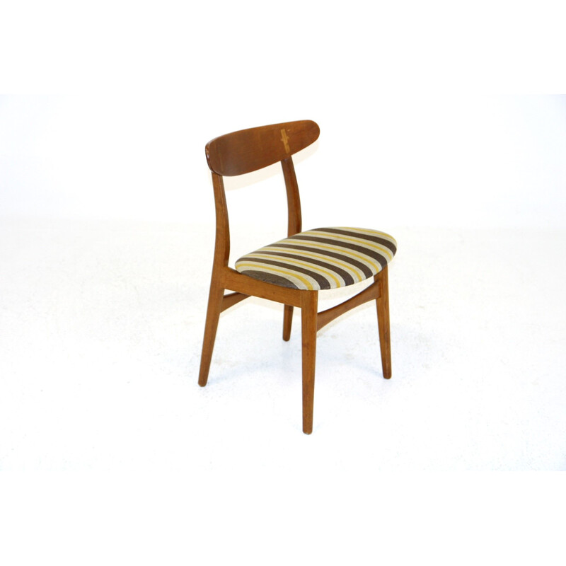 Set van 4 vintage eiken stoelen van Hans J. Wegner voor Carl Hansen