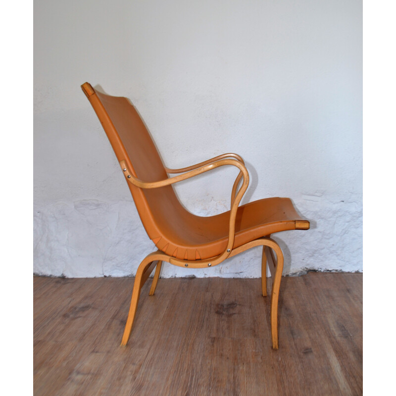 Fauteuil "Eva" Dux en bois courbé et cuir orange, Bruno MATTHSON - 1970