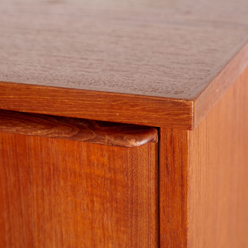 Teak vintage chest of drawers on cylindrical legs, Denmark