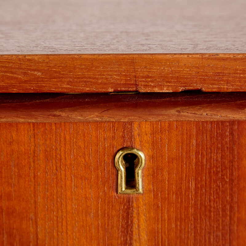 Teak vintage chest of drawers on cylindrical legs, Denmark