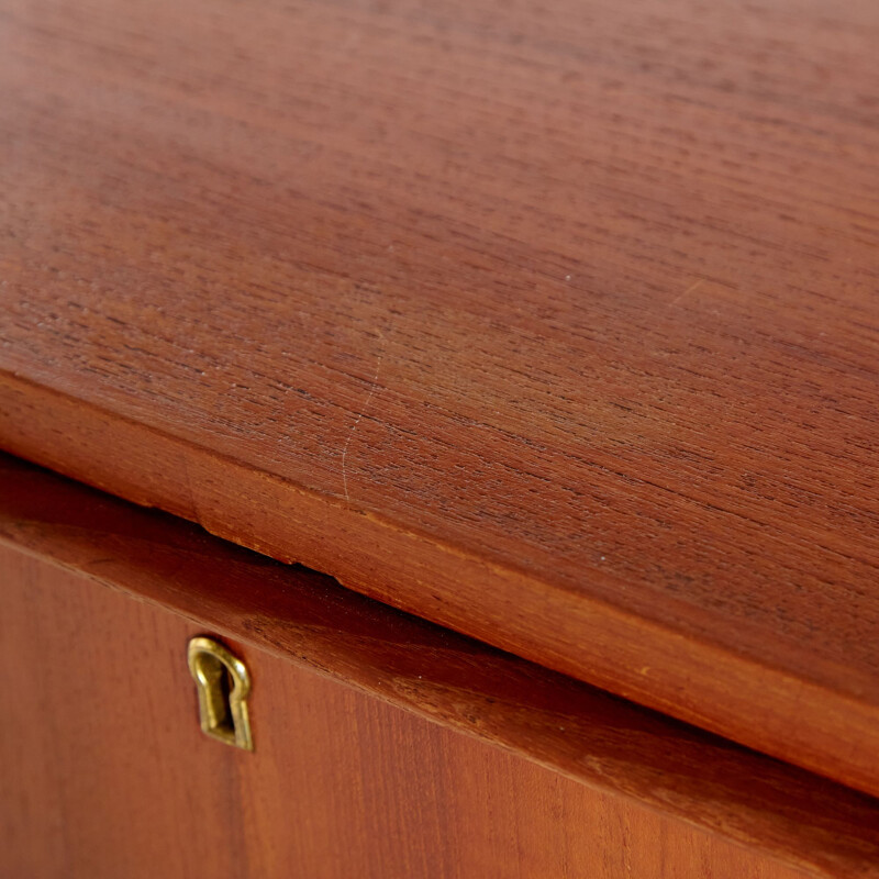 Teak vintage chest of drawers on cylindrical legs, Denmark
