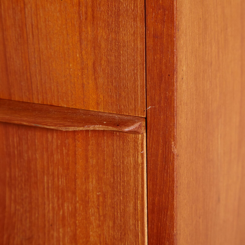 Teak vintage chest of drawers on cylindrical legs, Denmark