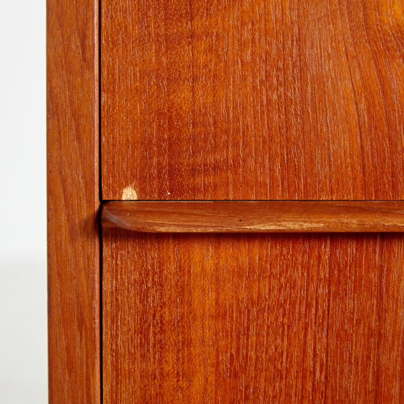 Teak vintage chest of drawers on cylindrical legs, Denmark