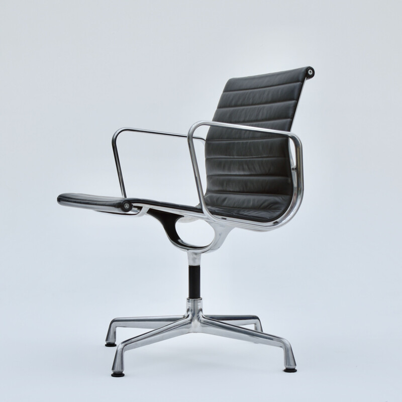 Vintage aluminium and leather armchair by Eames for Vitra