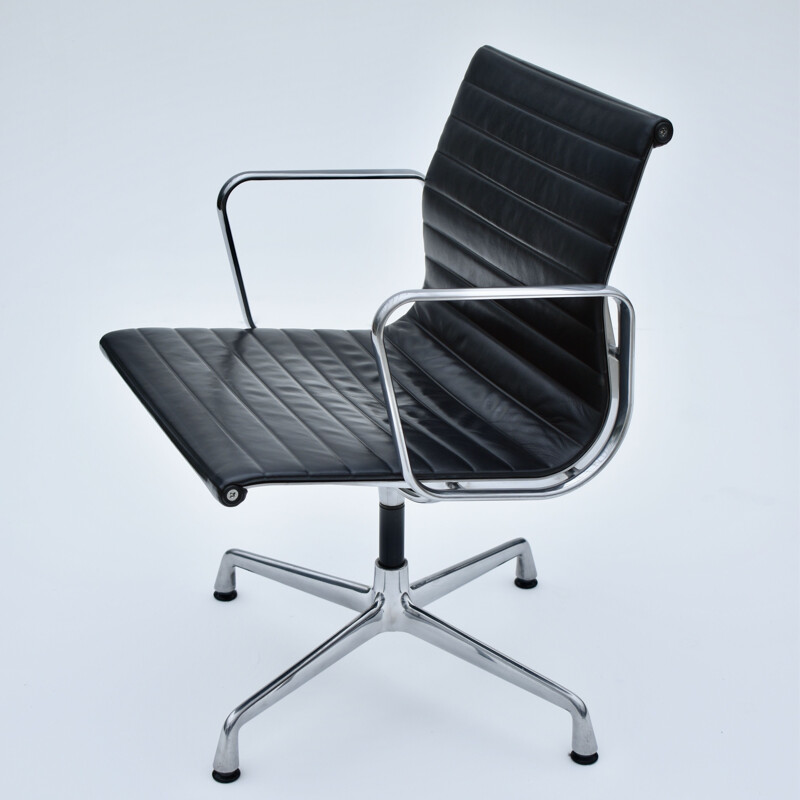 Vintage aluminium and leather armchair by Eames for Vitra