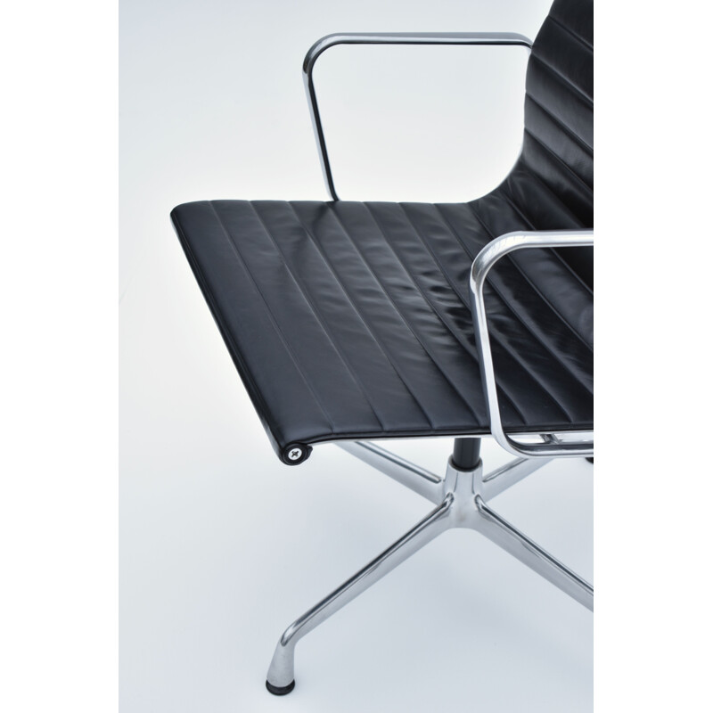 Vintage aluminium and leather armchair by Eames for Vitra