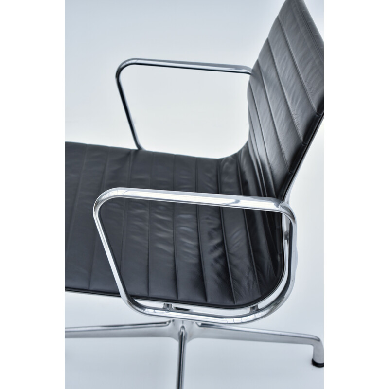 Vintage aluminium and leather armchair by Eames for Vitra