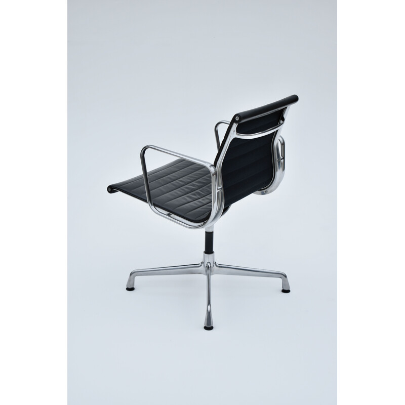 Vintage aluminium and leather armchair by Eames for Vitra