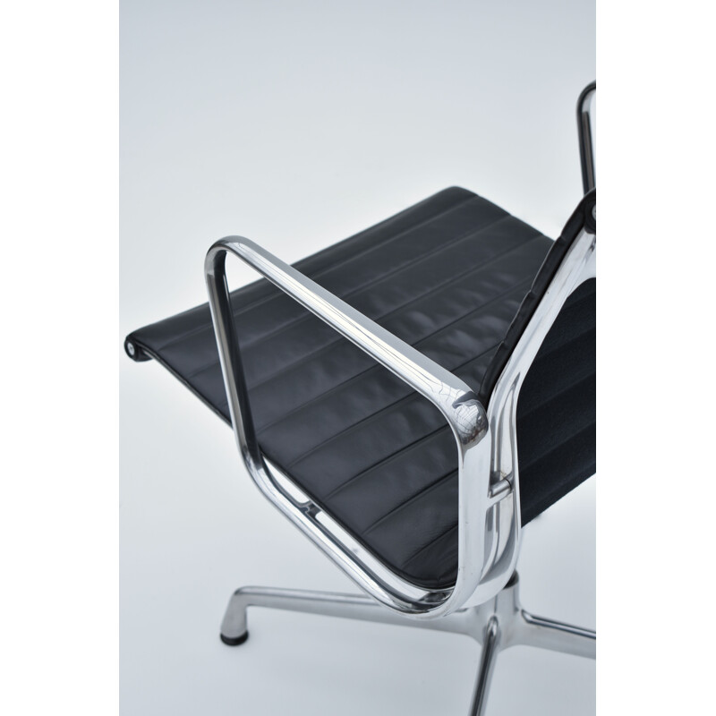 Vintage aluminium and leather armchair by Eames for Vitra