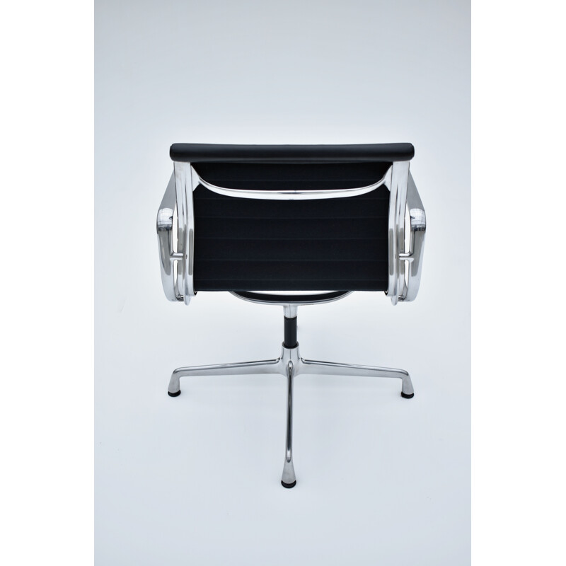 Vintage aluminium and leather armchair by Eames for Vitra