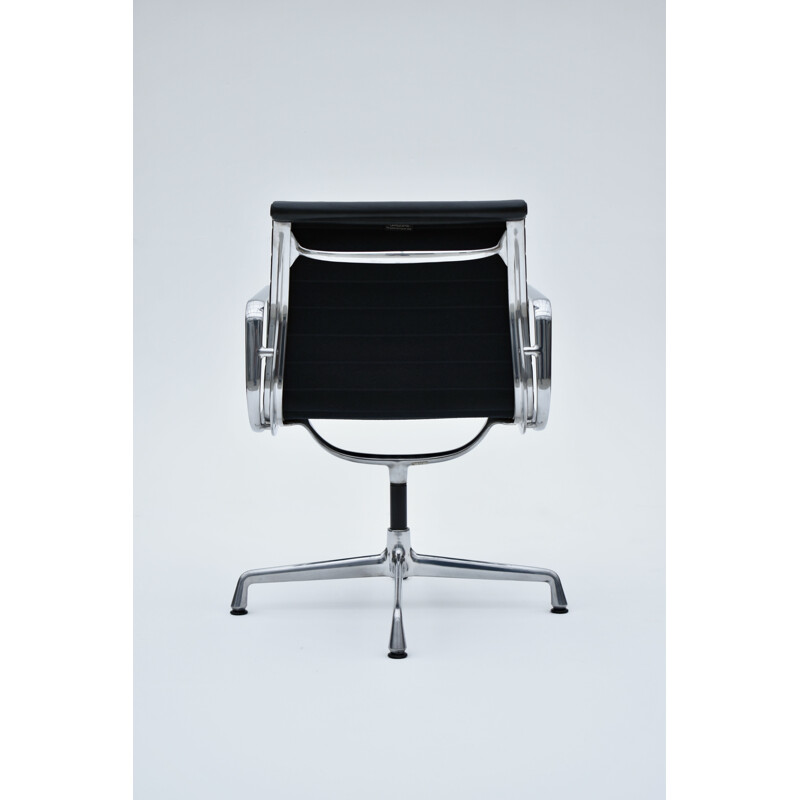 Vintage aluminium and leather armchair by Eames for Vitra