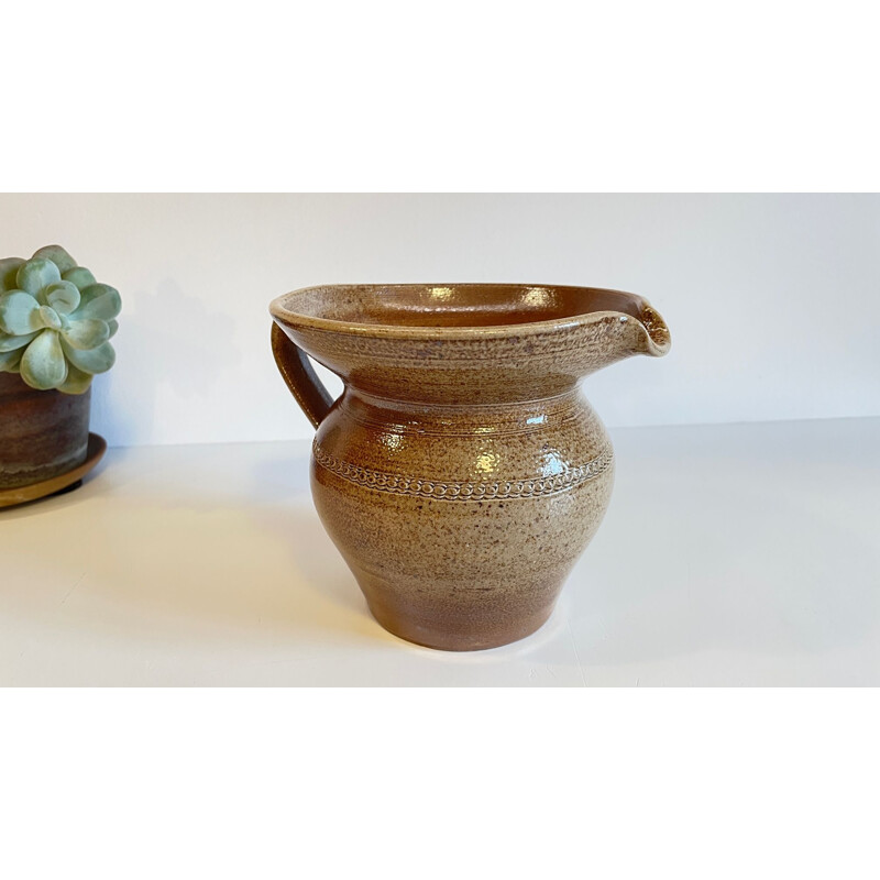 Vintage pitcher in enamelled stoneware