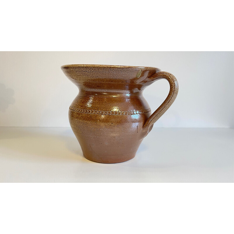 Vintage pitcher in enamelled stoneware