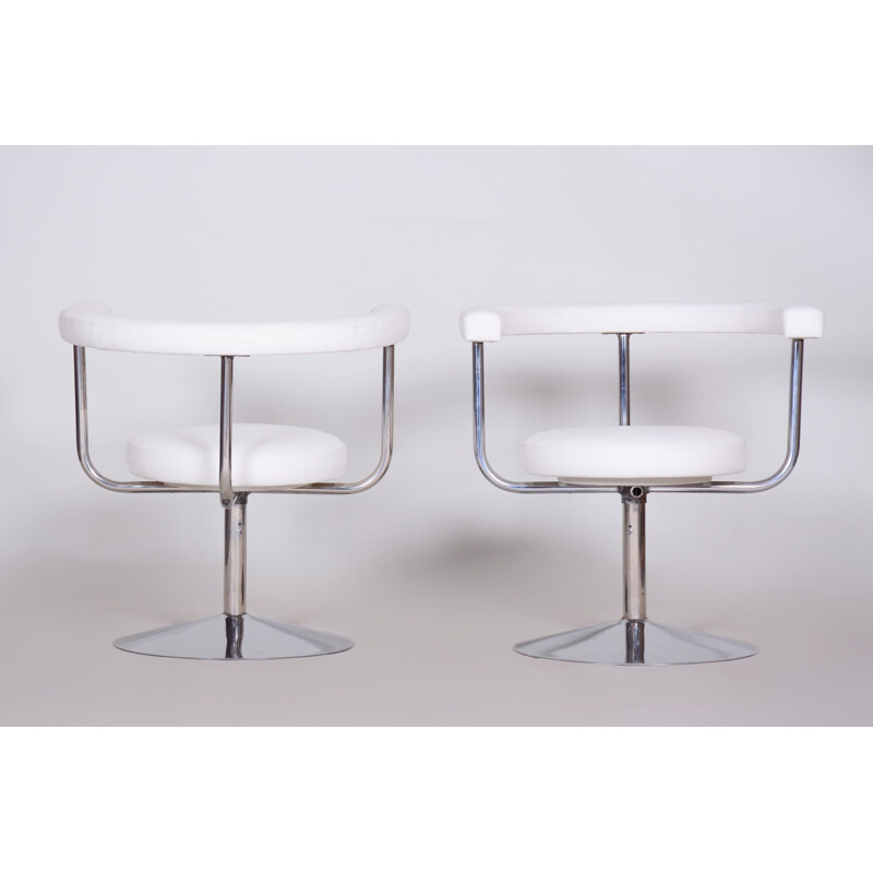 Pair of vintage white swivel leather and steel armchairs, 1940s