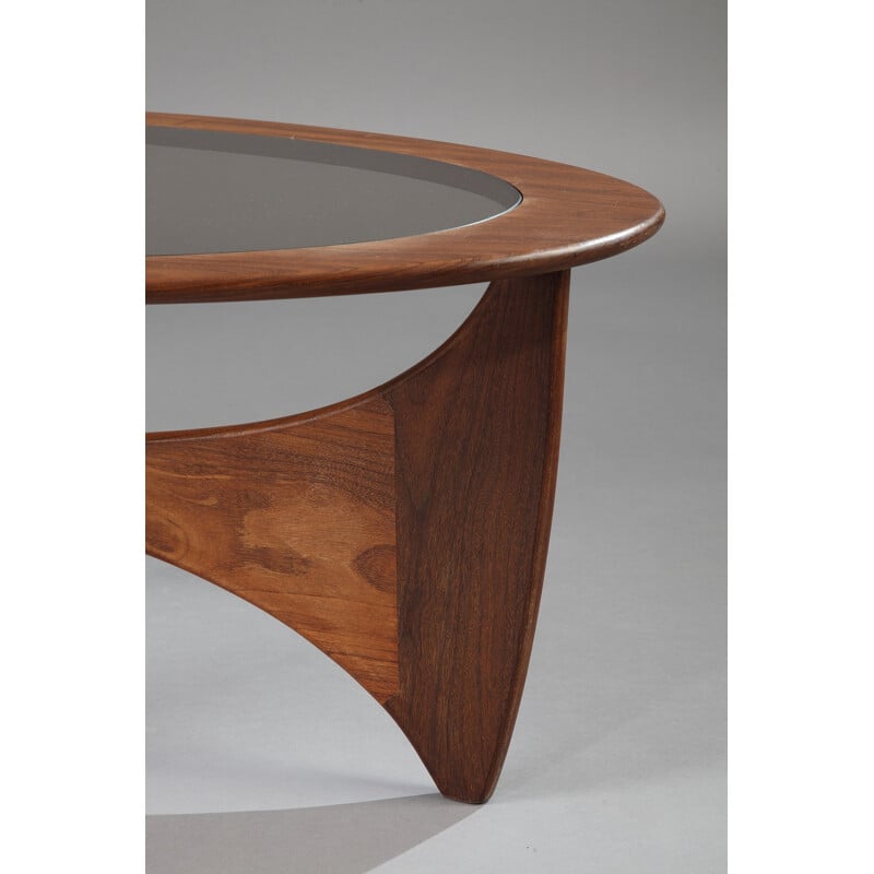 Oval G-Plan "Astro" coffee table in teak and smoked glass, Victor WILKINS - 1960s