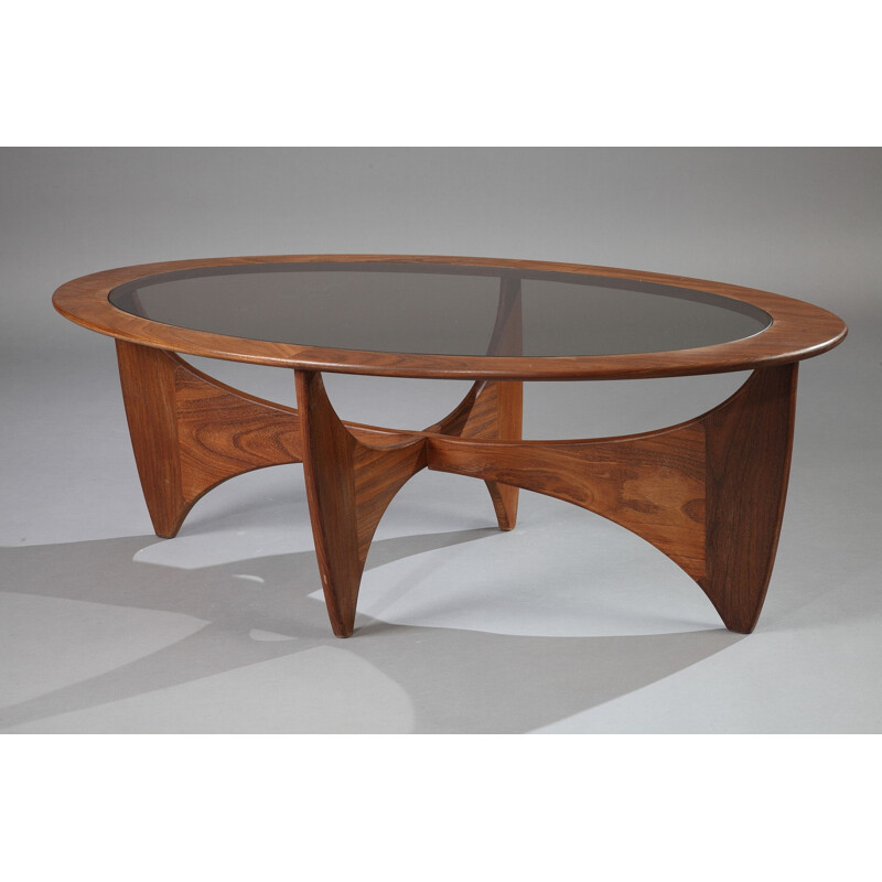 Oval G-Plan "Astro" coffee table in teak and smoked glass, Victor WILKINS - 1960s