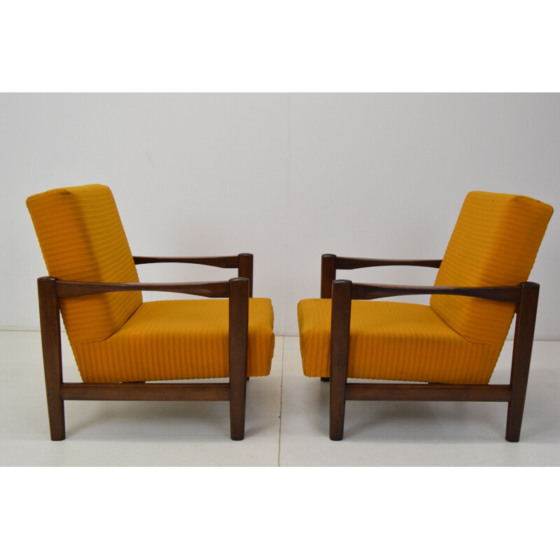 Pair of mid-century wood and fabric armchairs, Czechoslovakia 1960s