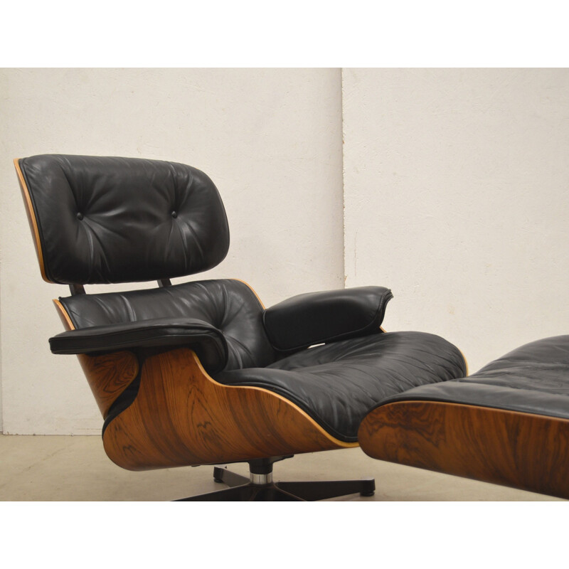 Vintage "Vitra" lounge chair and ottoman by Charles Eames, 1980s