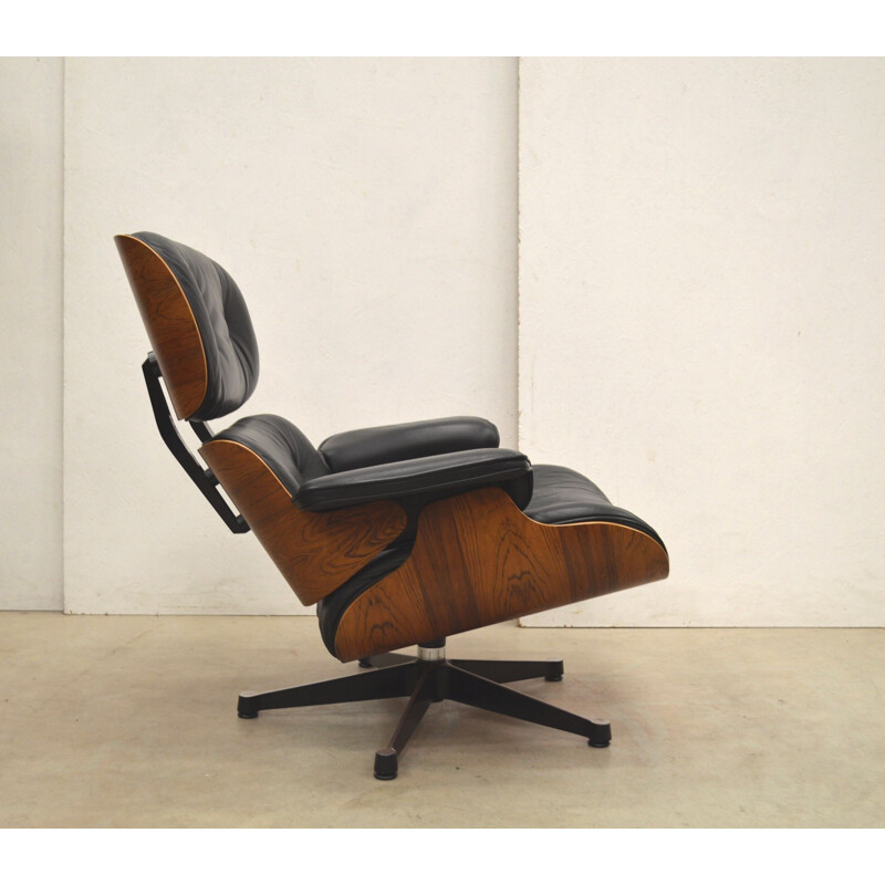 Vintage "Vitra" lounge chair and ottoman by Charles Eames, 1980s