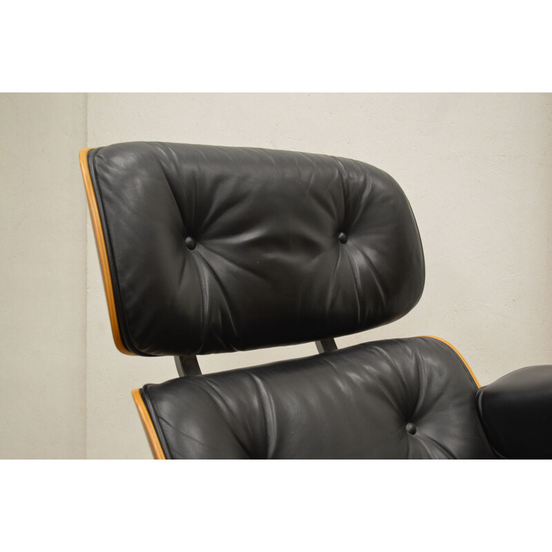 Vintage "Vitra" lounge chair and ottoman by Charles Eames, 1980s