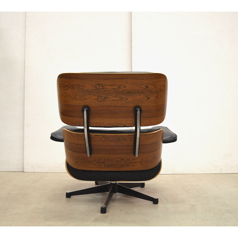 Vintage "Vitra" lounge chair and ottoman by Charles Eames, 1980s