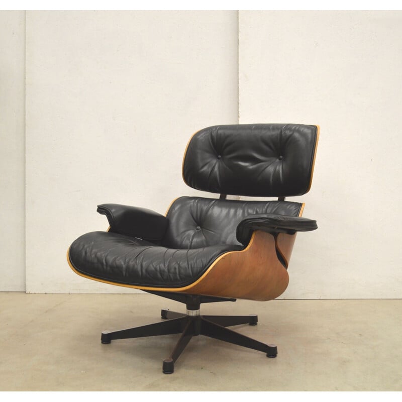 Vintage "Vitra" lounge chair and ottoman by Charles Eames, 1980s