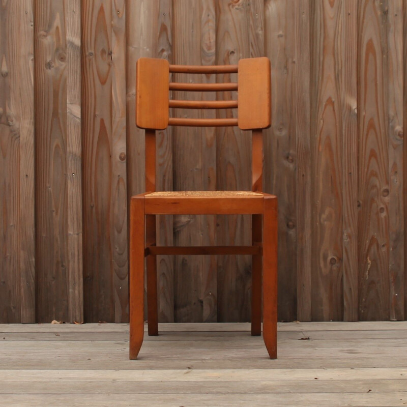Chaise vintage en bois et paille par Pierre Cruege