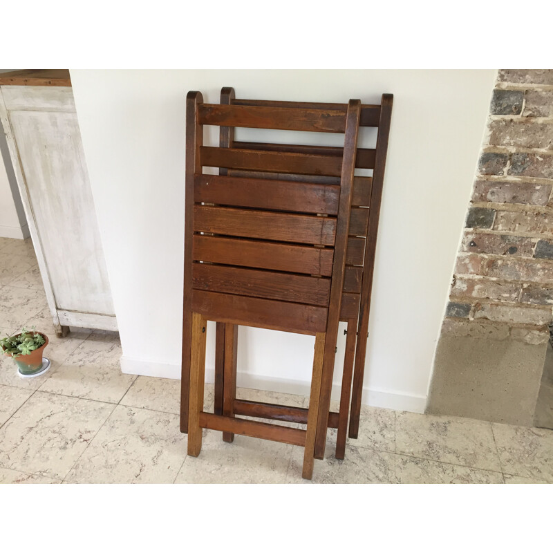 Pair of vintage wooden folding chairs