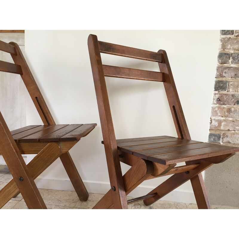 Pair of vintage wooden folding chairs