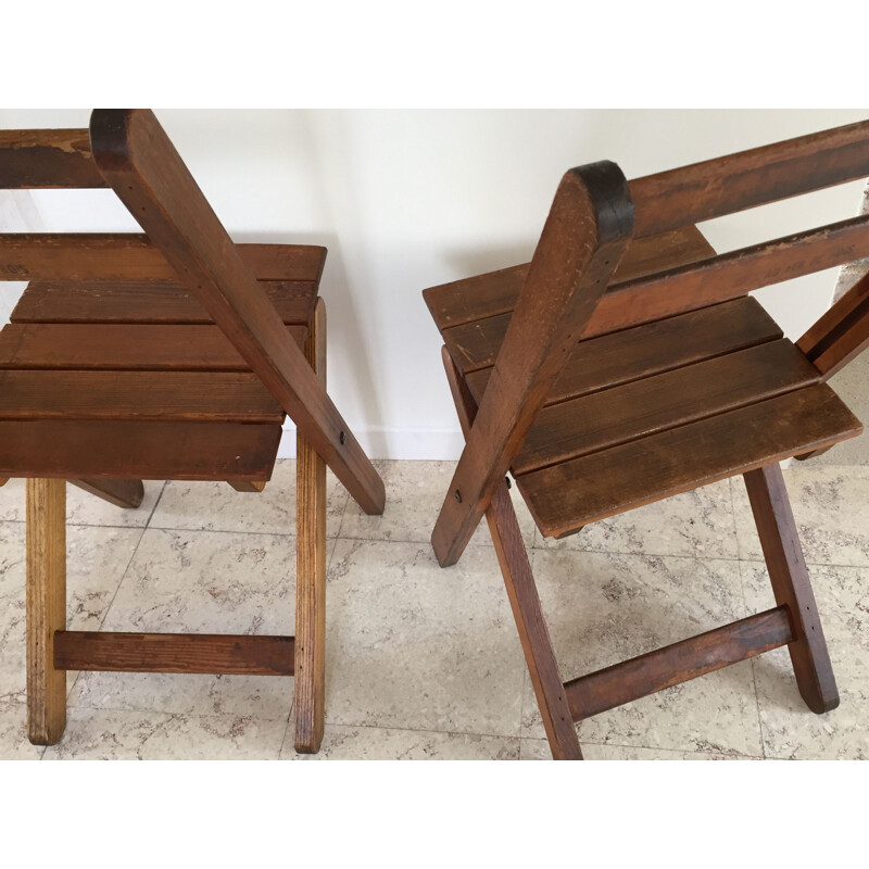 Pair of vintage wooden folding chairs